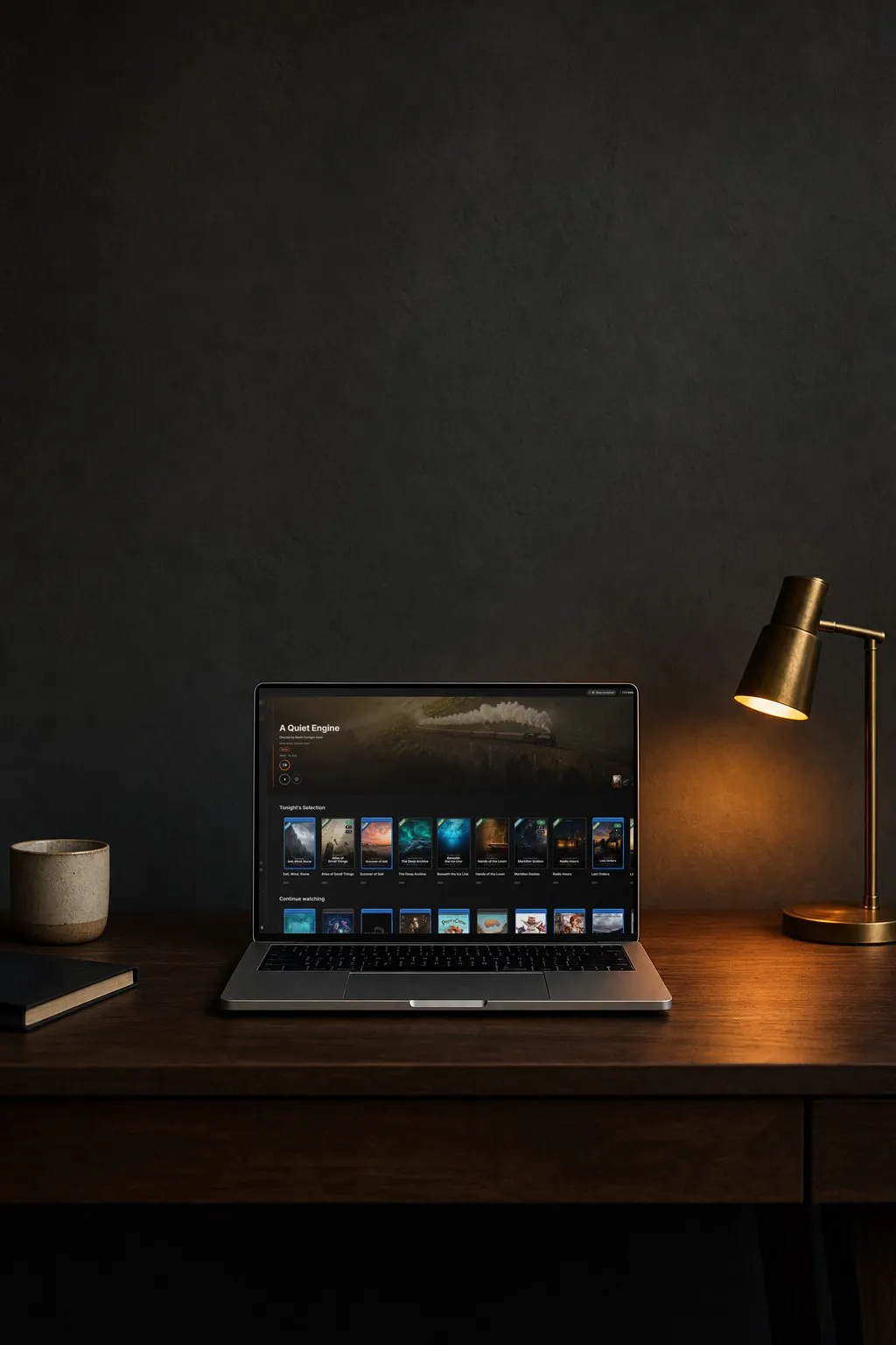 A laptop on a desk with the Quven Home